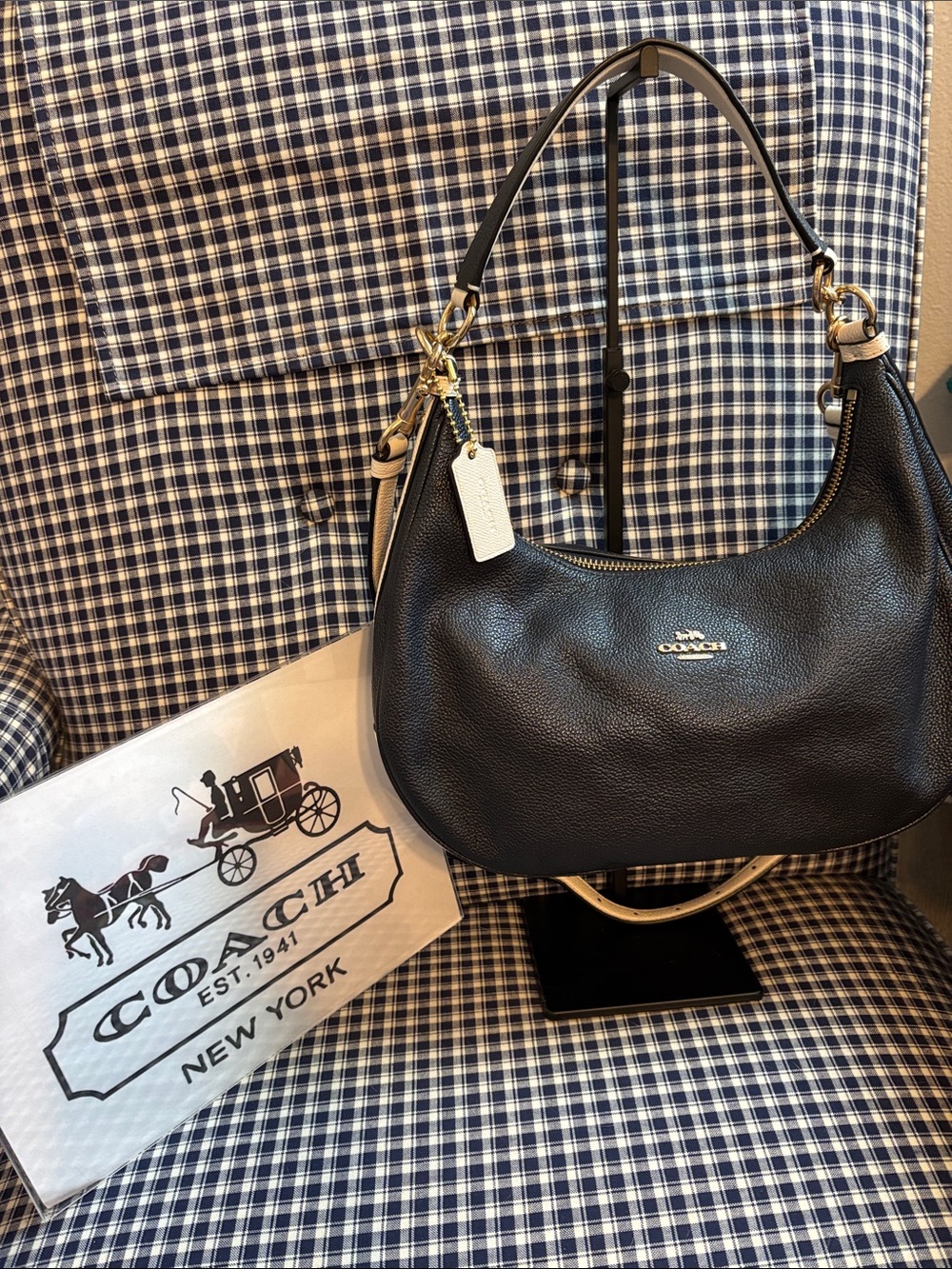 Coach East West Harley Hobo in black and cream Pebbled Leather